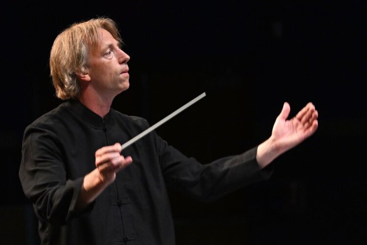 Creative director Eckart Preu conducting a performance. A native German, he enjoys Cincinnati’s collaborative artistic community as well as its German heritage.