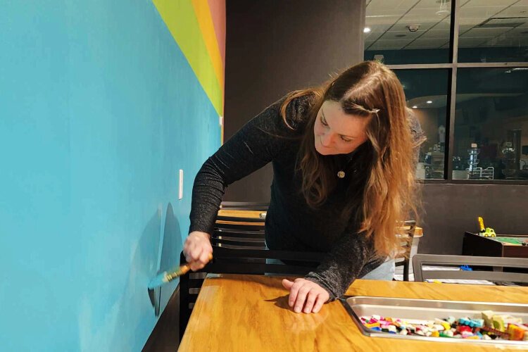 Serenity Johnson "brightens things up a little" at the Brickery.