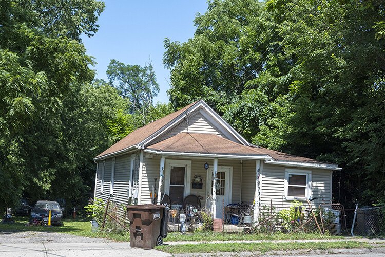 This rental in the Springfield Township neighborhood of West College Hill, and eight others, will be rehabbed.