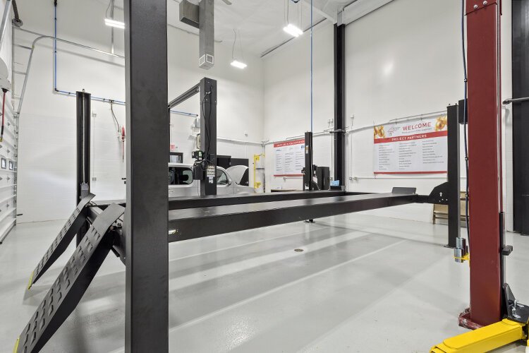 The all-important lifts, which will facilitate mechanics working underneath the cars, were installed last week.