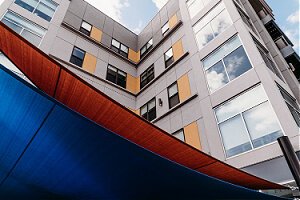 More than 300 new apartments form the core of the project.