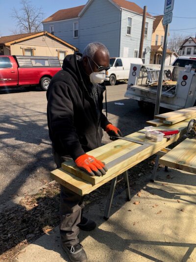Lewis Cartwright, one of PWC’s Lead Abatement contractors doing some general repair work.