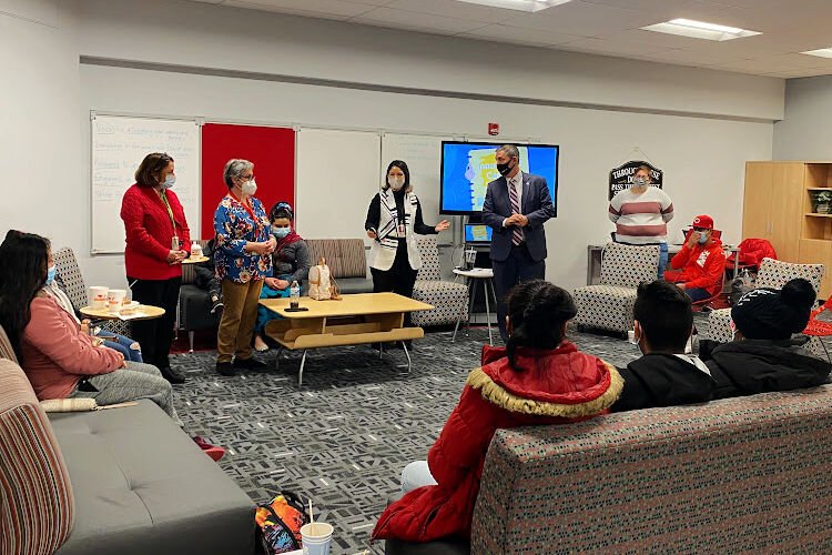 The district's Second Cup of Coffee program delivers valuable information using Spanish interpretation.