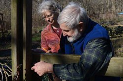 Jim Schenk with ecovillage resident Deborah Jordan in 2012