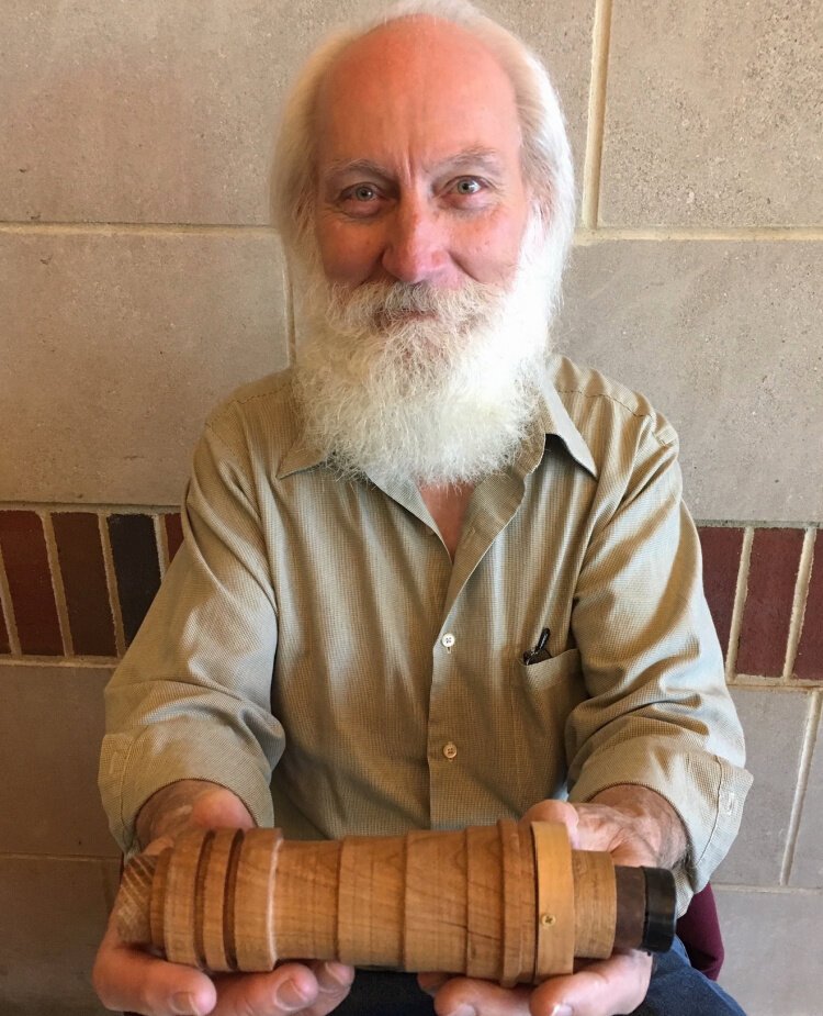 Steve Kosztala showing one of his hand-crafted KOSZTALASCOPES.