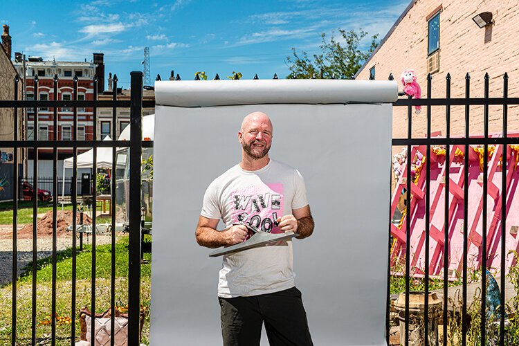 Scottie Bellissemo creates his own artwork and custom wood furniture. 