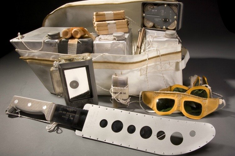 The astronauts' survival kits included everything from sunscreen to a machete.