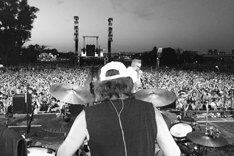 Devendorf overlooking a large crowd at Osheaga, a music festival in Montreal.