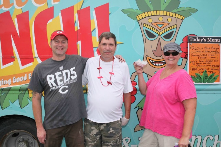 Dennis Wittkorn with volunteers Michael Centrullo and Nadine Schindler.