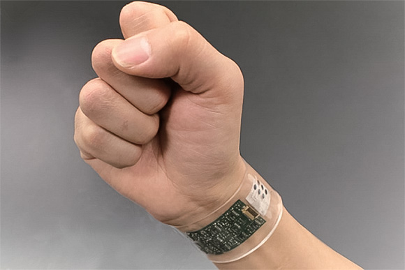 Sweat Sensor in a flexible plastic wristband : photo credit Nature