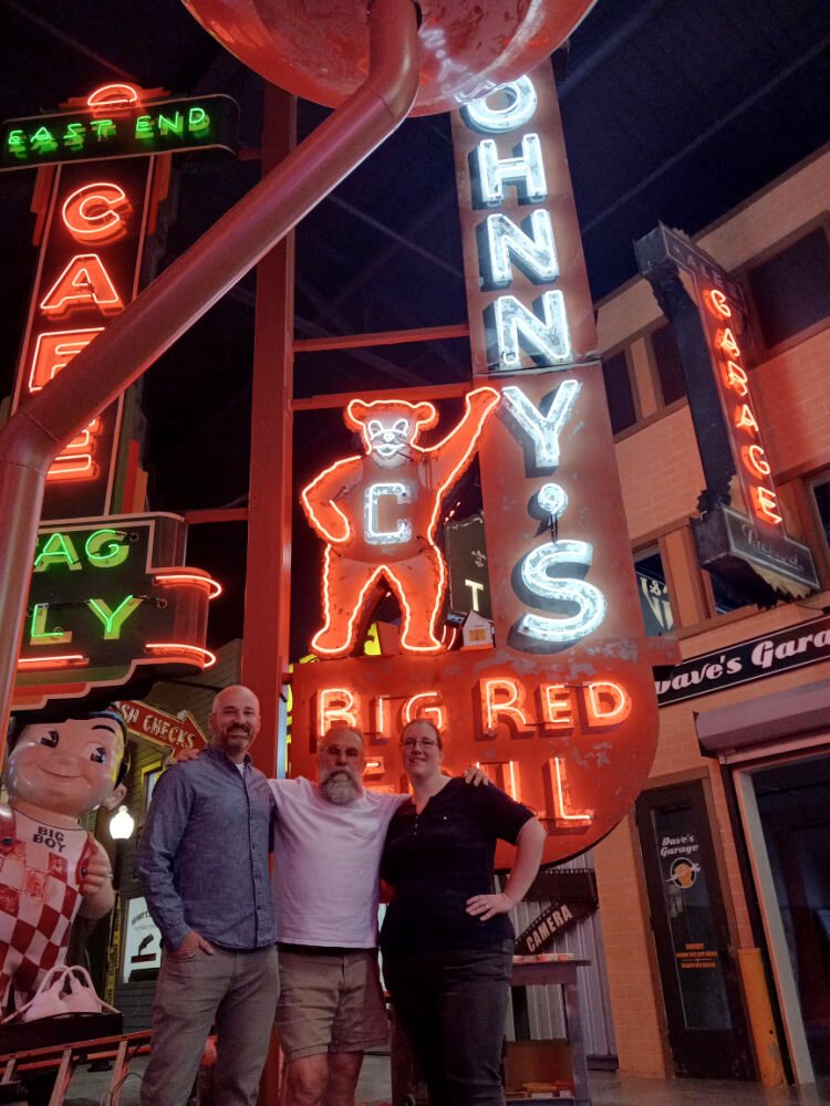 L to R: David Dupee, Tod Swormstedt, and Erin Holland in front of a sign obtained from an Ithaca, NY restaurant that operated 1919-1981, though the sign remained in place until 2009. The Johnny’s sign is the largest addition to the museum expansion.