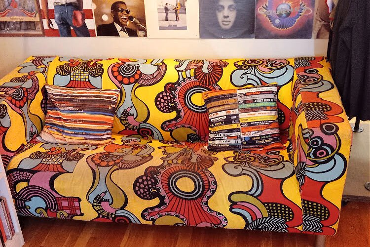 This vibrantly colored couch creates an immediate atmosphere for Spiral Groove’s patrons.