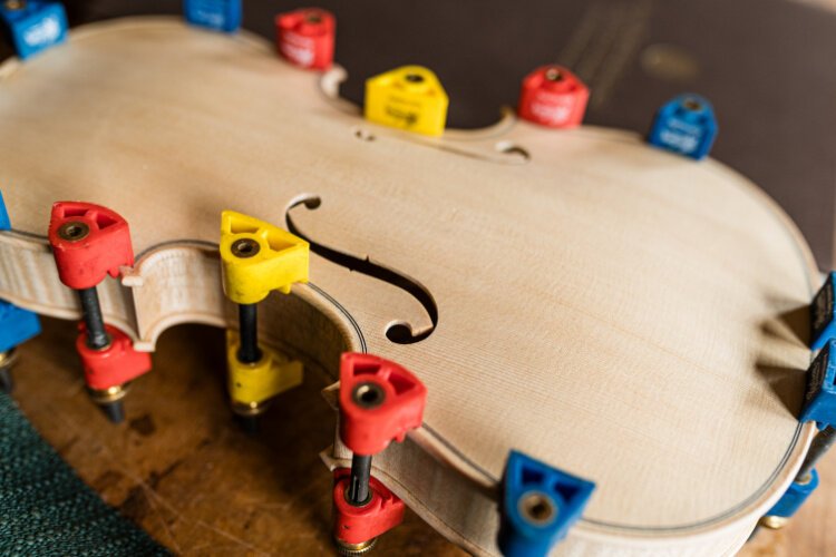 Gray makes a few pieces a year and they can takes months to complete. He also does restoration and repairs.