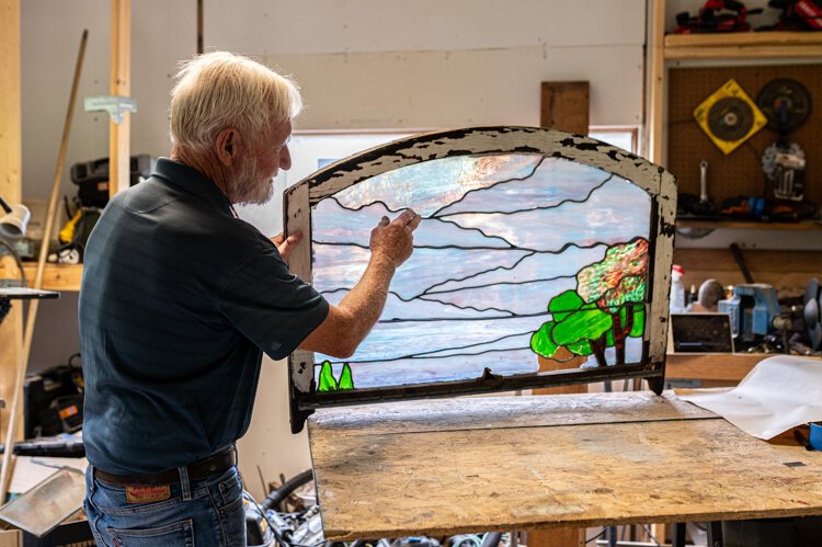 Terry Rasche learned the craft from his father who was one of a handful of stained glass artisans in the area.