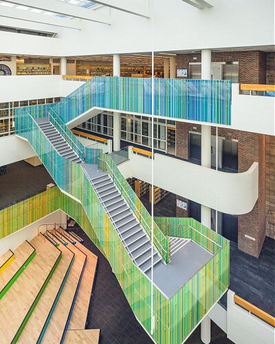 The “Social Staircase” is a focal point of the interior renovations at the downtown library helps visitors find their way.