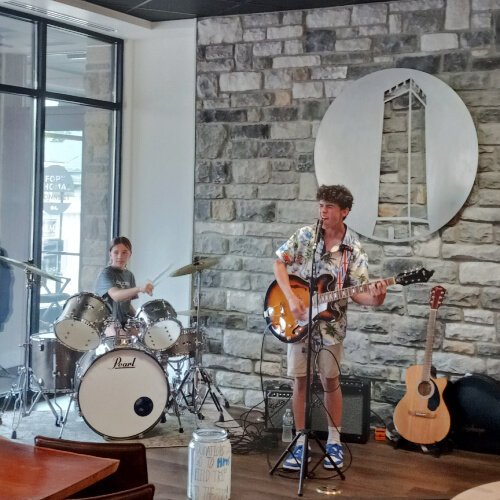 Fort Thomas Coffee hosted a fundraiser for a Highlands Middle School trip to Cincinnati Zoo. The student duo of Quentin Tomlin and Charlotte Agin, performing as The Angle, played on the FTC stage.