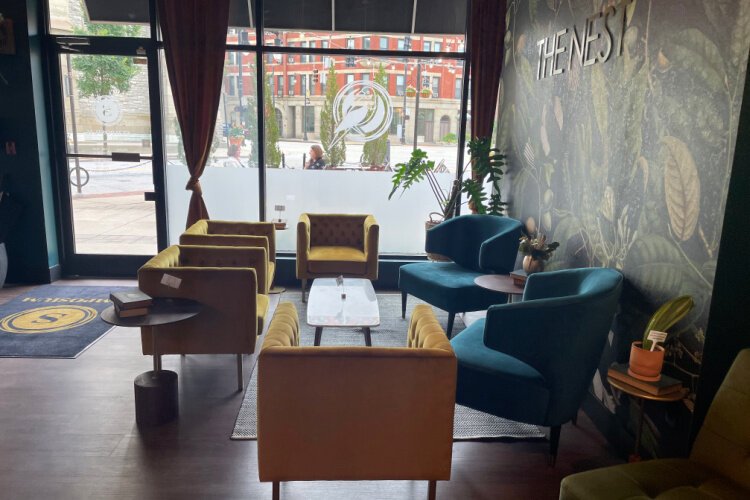 Both the patio seating or the chair grouping called The Nest offer picturesque views of the exterior of St. Francis de Sales church.