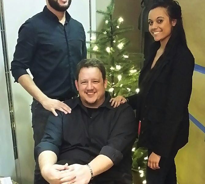 Guido Salzano (center) with employees Will and Lexi