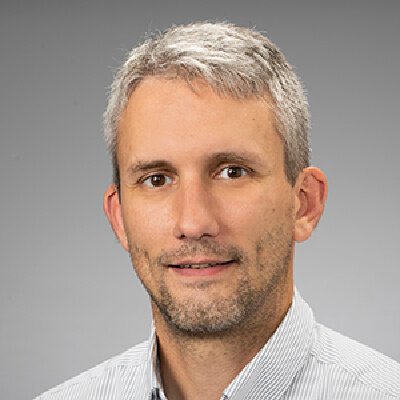 Wood Hudson alumni and  board member, Doug Hartman, is a staff pathologist at a private lab. 