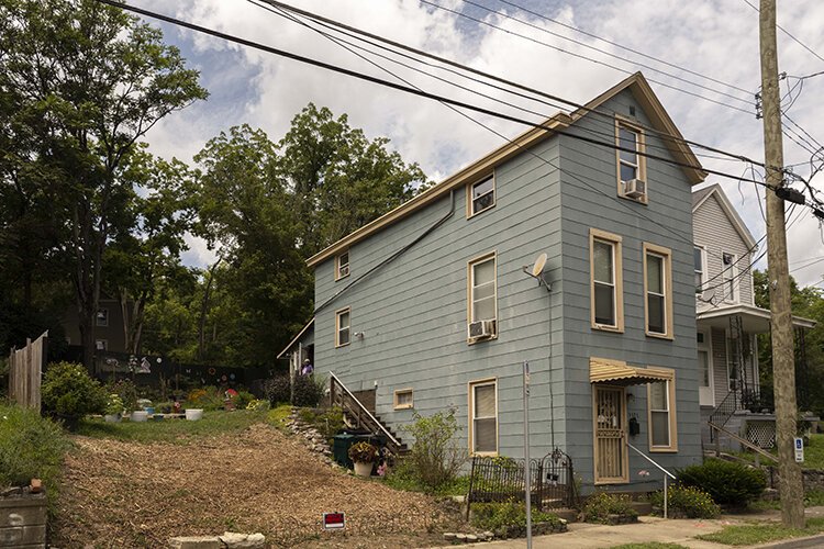 A vacant lot next to Val Glenn's South Cumminsville home became a vegetable and flower garden.