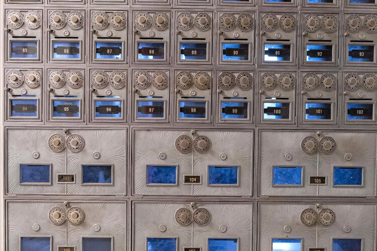 Mailboxes in C.T. A subject of intrigue for their Art Deco look inside of a Brutalist building.