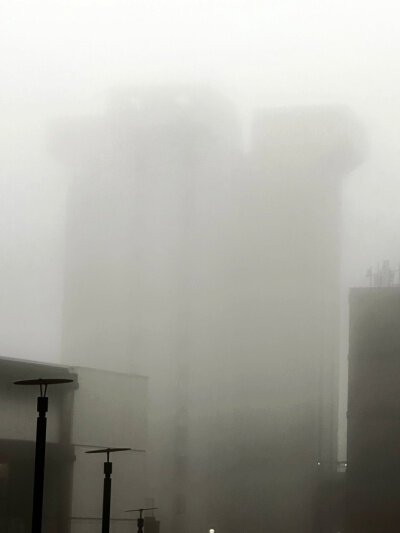 An image of CT masked by fog, a ghost-building foretelling.